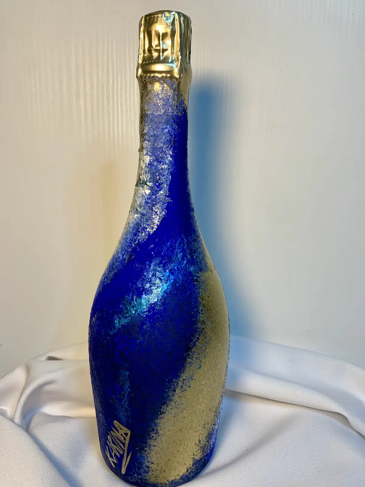 Bottiglia astratta blu - oro 